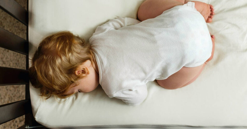 why do babies sleep with their butt in the air